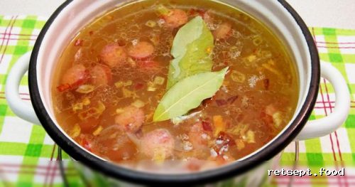 Фото приготовления рецепта: Сырный суп с копчёными колбасками, картофелем и рисом - шаг №12